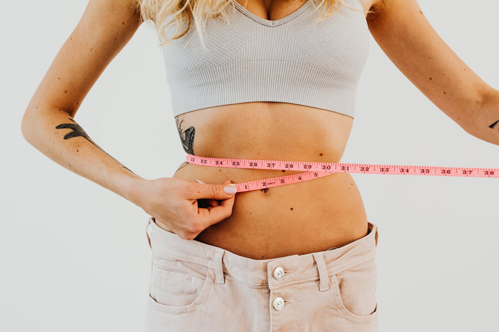 Does a waist trainer flatten your stomach?